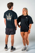 Athletes wearing the black Builders Tee relaxed fit gym t-shirt by Empire Fit front and back view