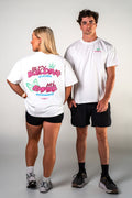 Male and female athletes wearing the white Busy Building My Empire graphic gym t-shirt by Empire Fit